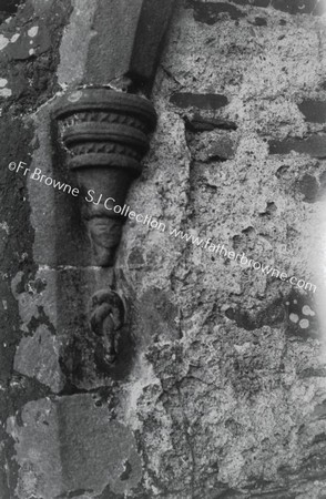 CURIOUS FINIAL MIXED GOTHIC AND CELTIC ON WINDOWS OF S. WALL